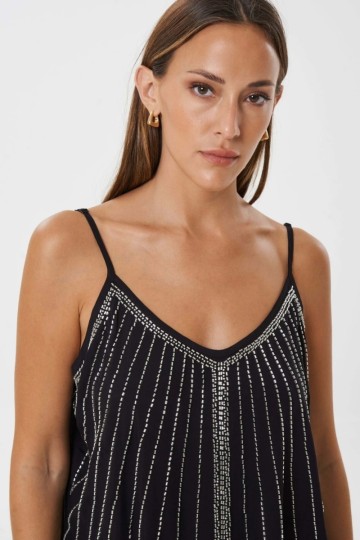 Musculosa linea canutillos